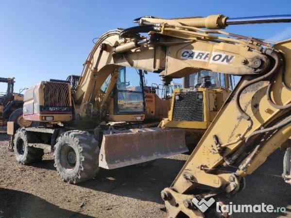 Dezmembram CATERPILLAR M312 An 1998